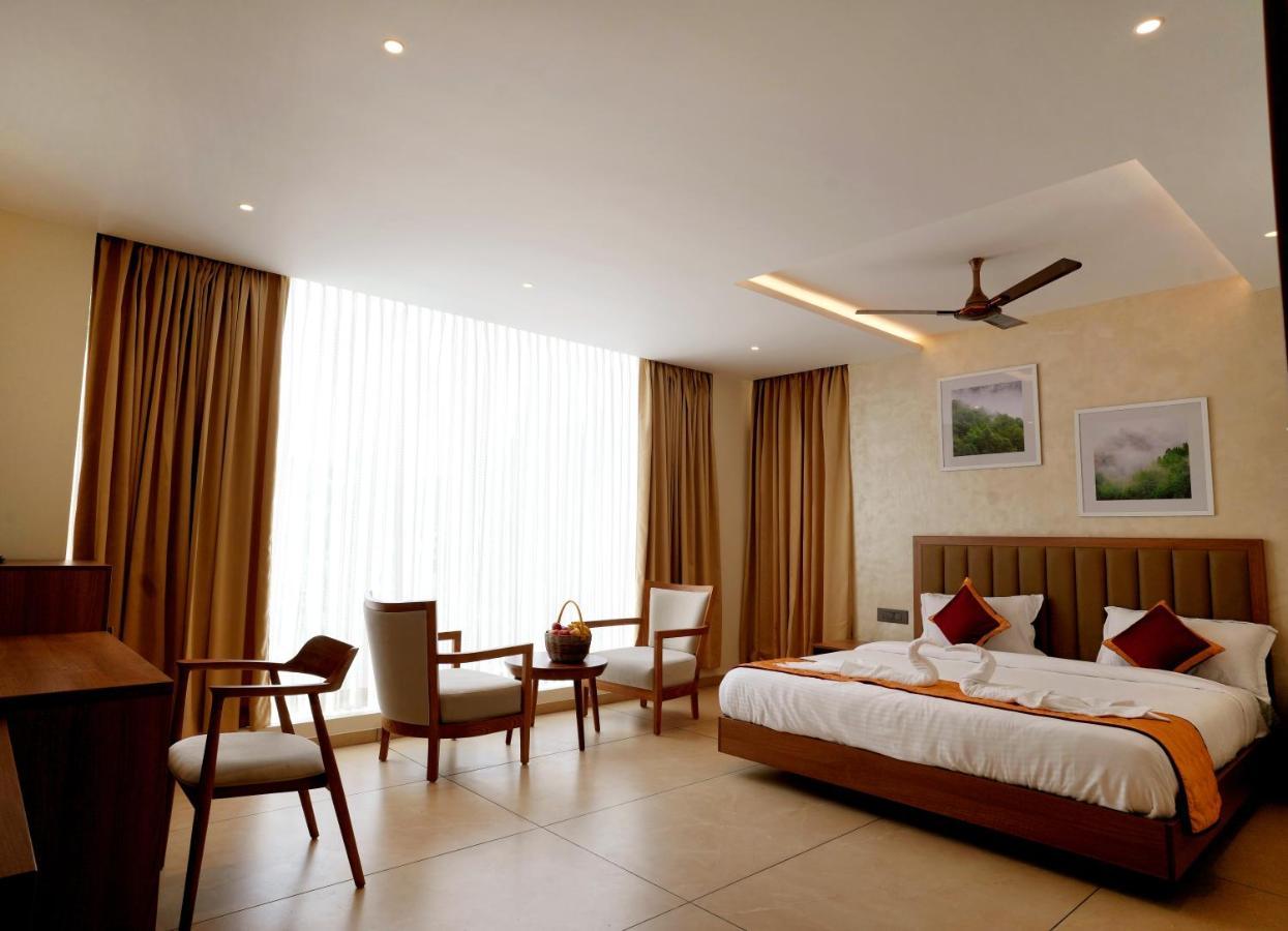 Bluemist Resorts Athirappilly Bagian luar foto
