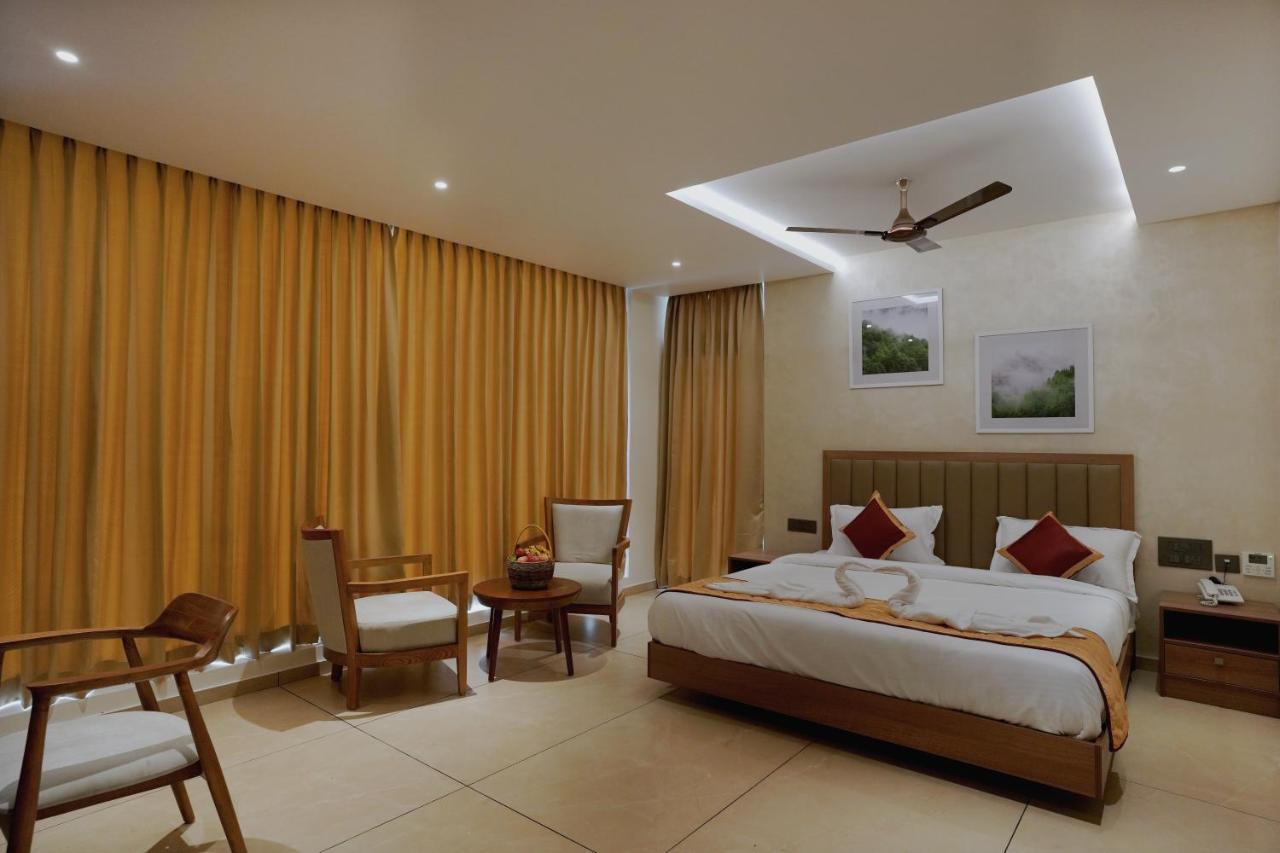 Bluemist Resorts Athirappilly Bagian luar foto