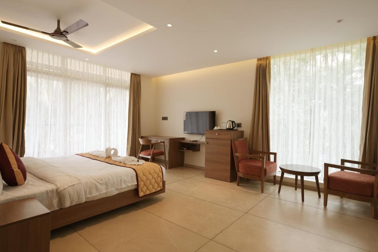 Bluemist Resorts Athirappilly Bagian luar foto