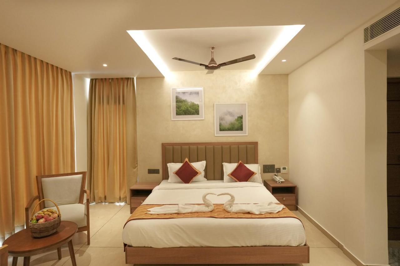 Bluemist Resorts Athirappilly Bagian luar foto